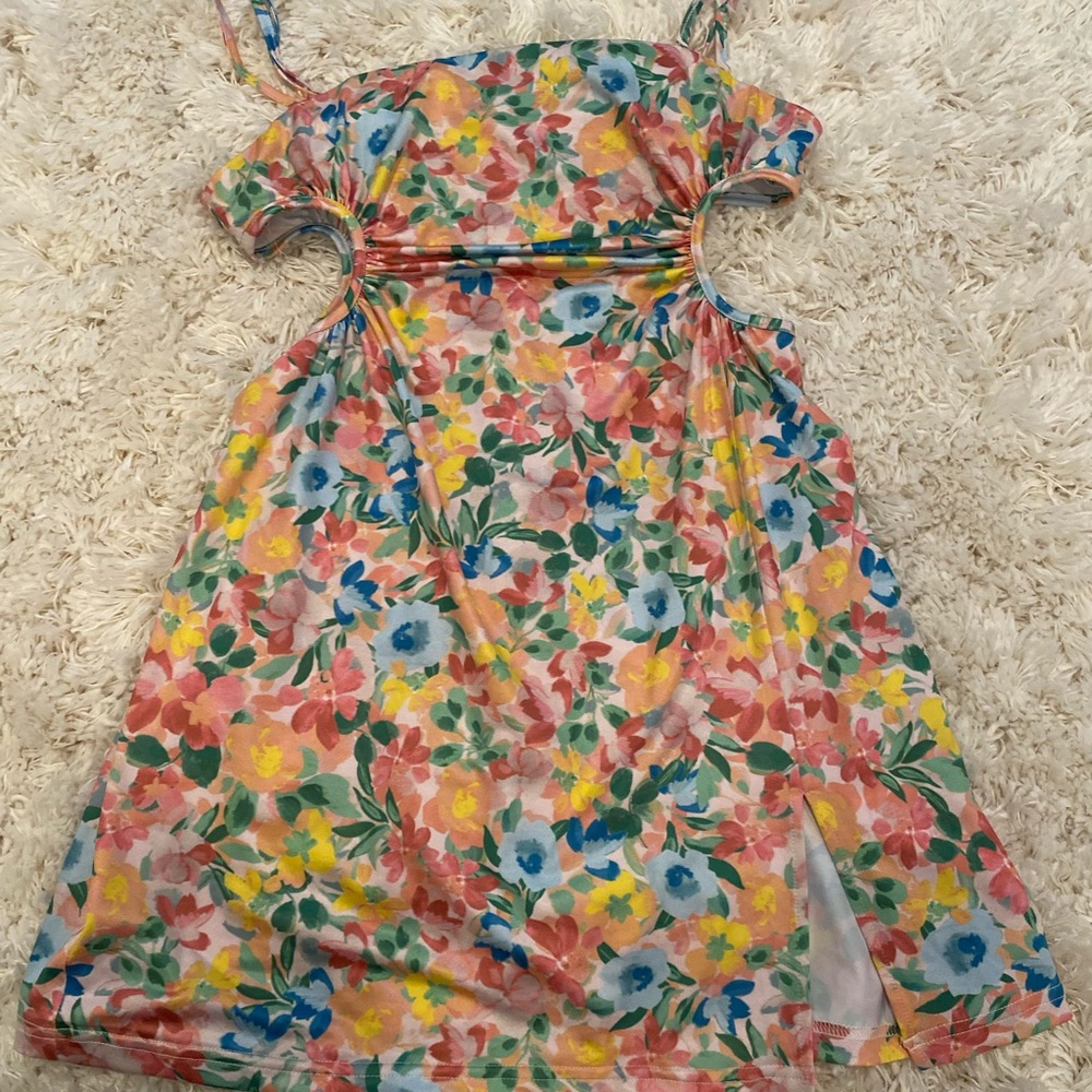 floral beginning boutique dress with cutouts